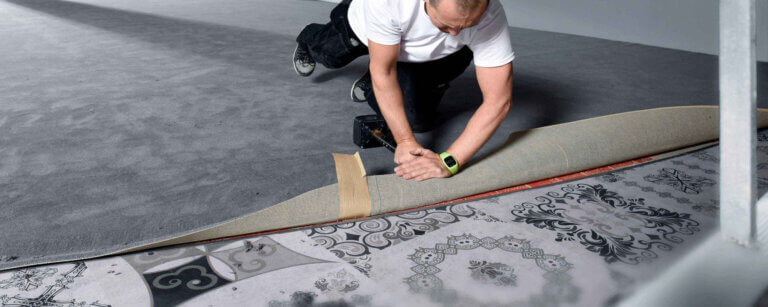 Die Fussbodentechnik & Design NRW GmbH bei einer Asbestbodensanierung