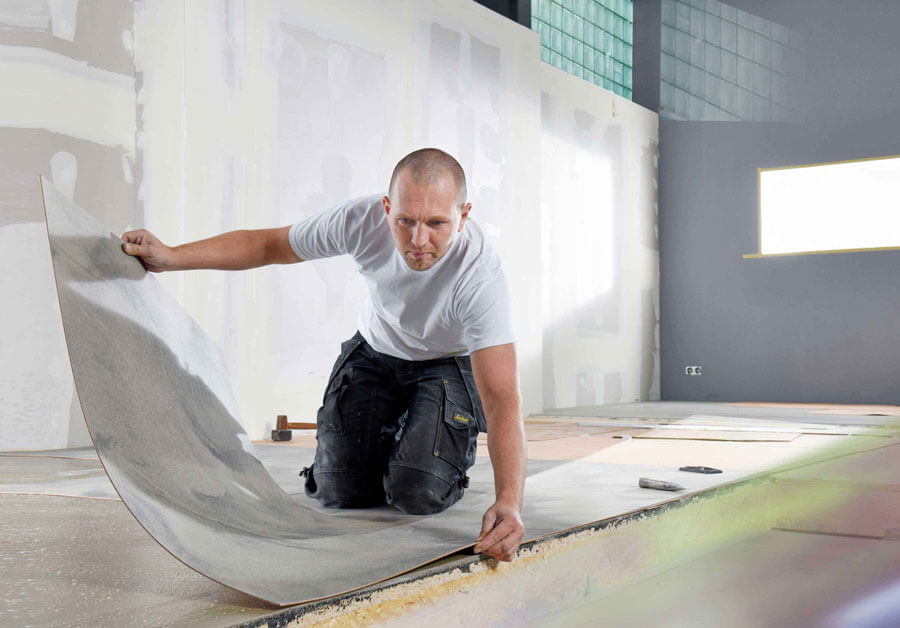 Die Fussbodentechnik & Design NRW GmbH bei einer Asbestbodensanierung