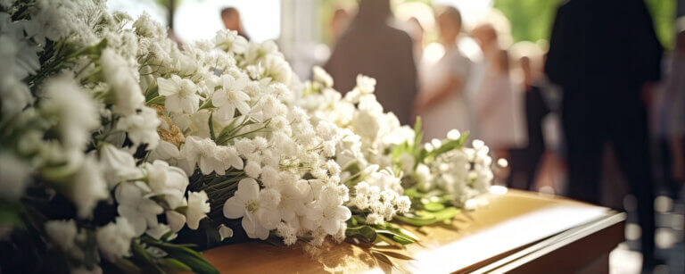Bestattungen in Preußisch Oldendorf | Blumen auf Sarg